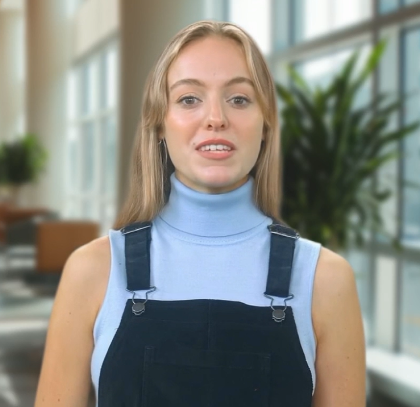 Instructor facing the camera while filming an explanatory video.